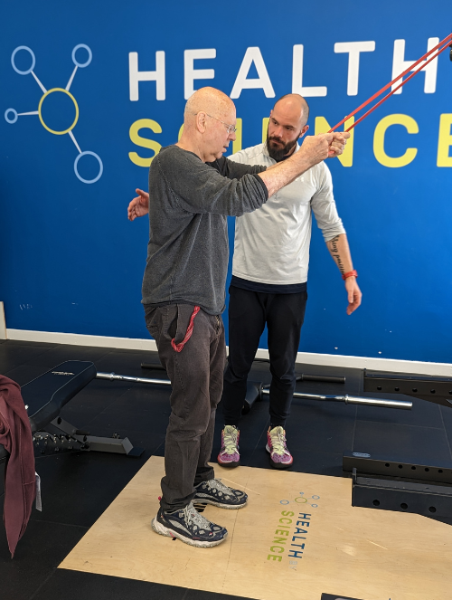personal trainer Kubo working with stroke survivor