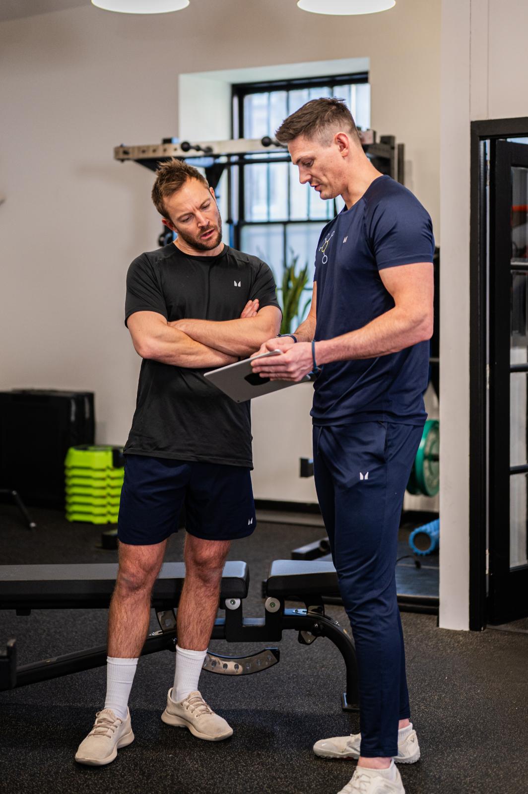 KA2_9247 Health by Science founders analyzing clinical data for personal training Edinburgh programs in our Leith gym.