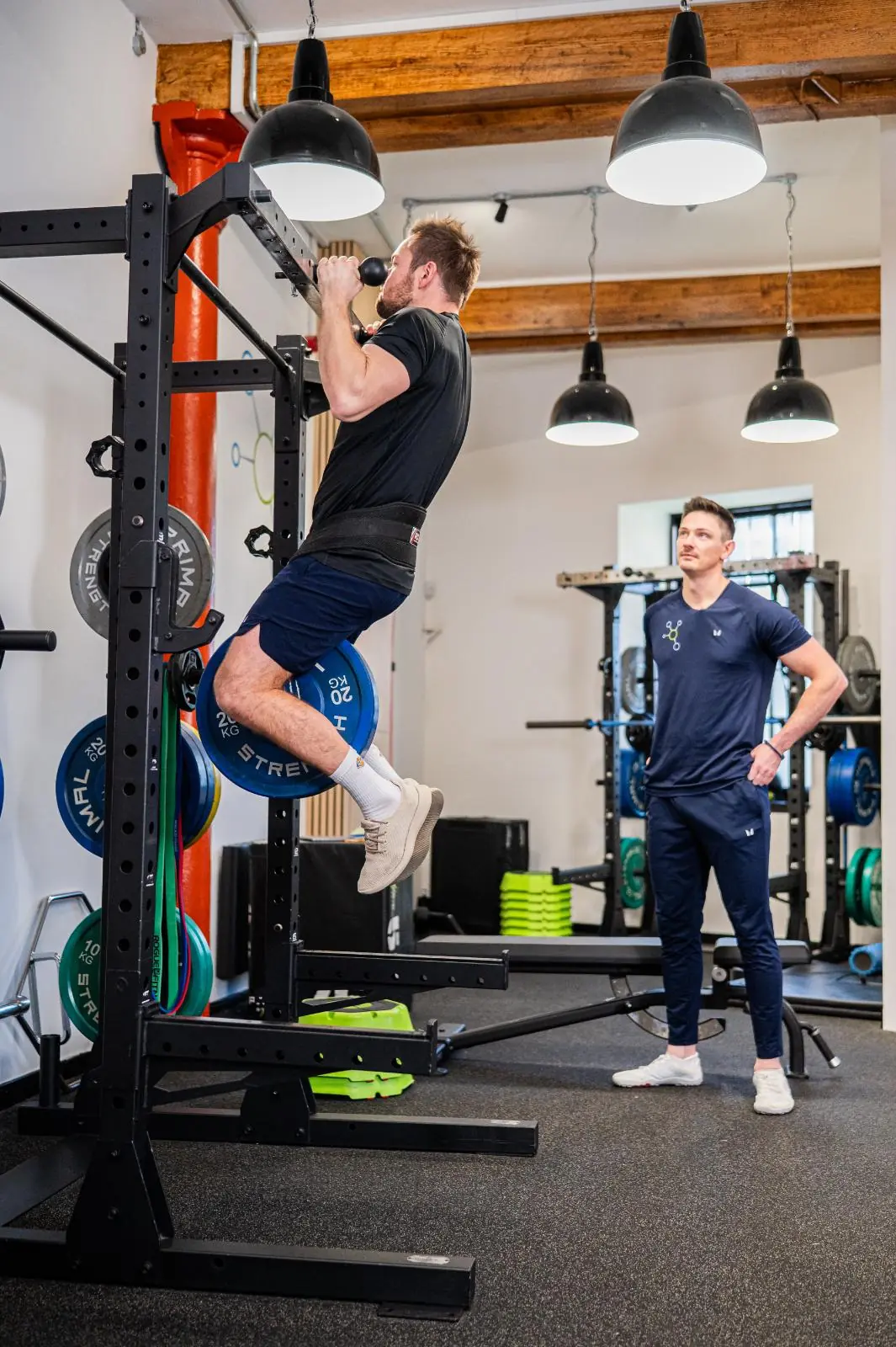 KA2_9379 Clinical assessment of a weighted pull-up to measure upper body strength for personal training Edinburgh in our Leith gym.