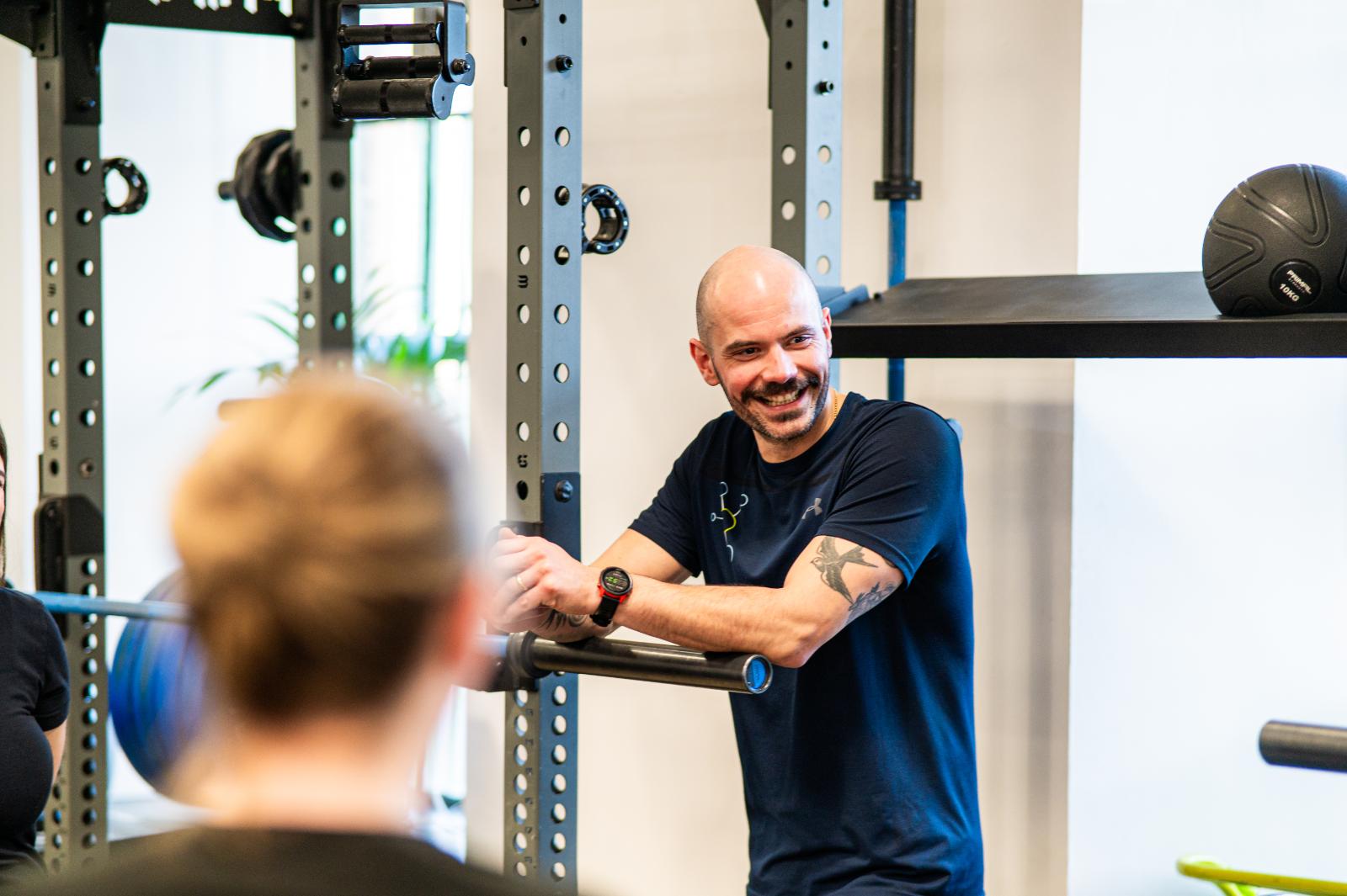 KA2_9568 Health by Science team member discussing evidence-based rehabilitation goals at our clinical facility in Leith.