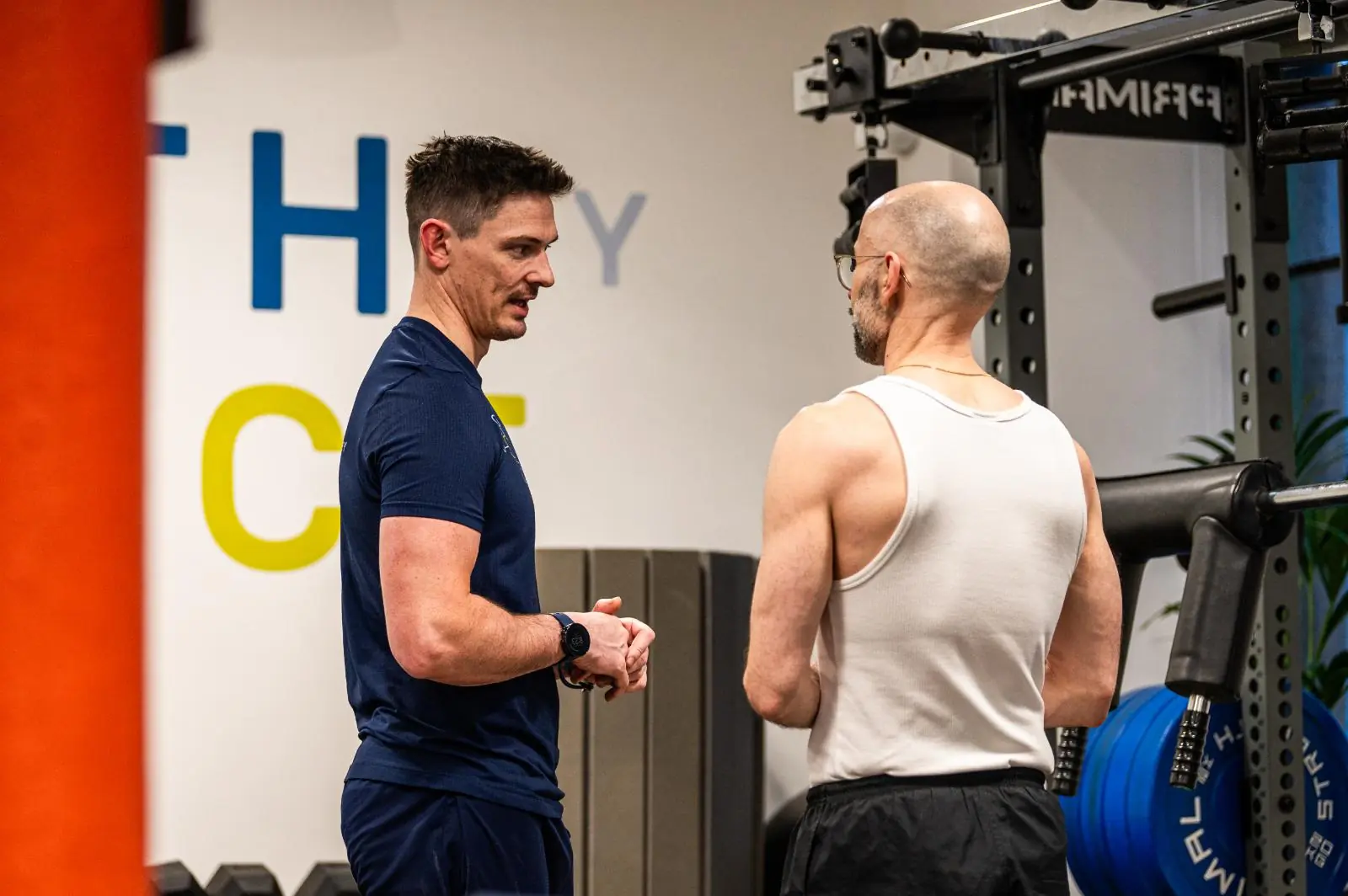 KA2_9662 Clinical discussion of rehabilitation goals and performance data between a specialist and client at Health by Science Leith.