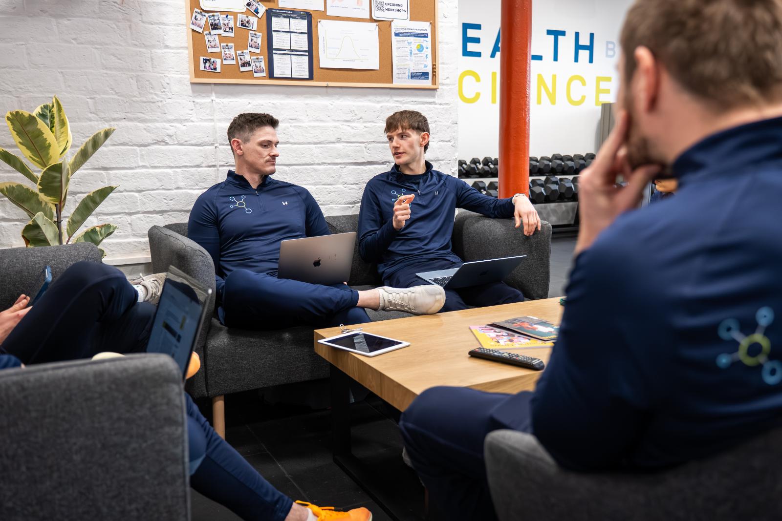 KA3_2213 Senior specialists at Health by Science discussing clinical exercise progressions for personal training Edinburgh programmes in Leith.