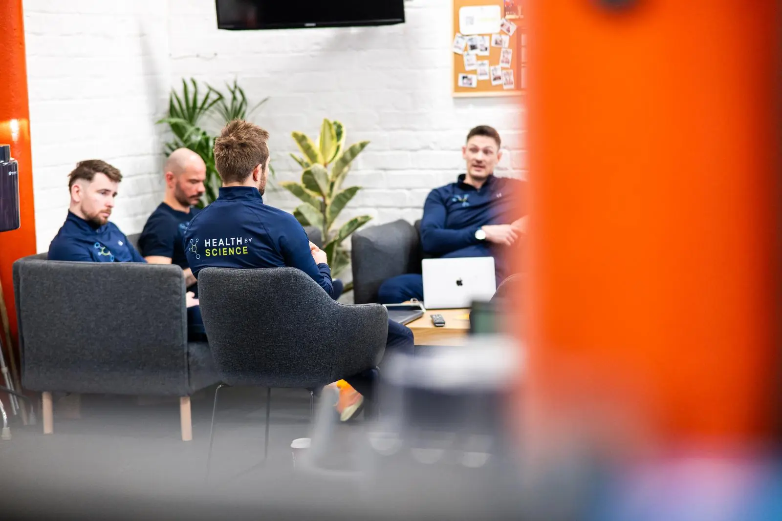 KA3_2420 Clinical staff collaborating on injury prevention strategies during a professional development session at Health by Science Leith.