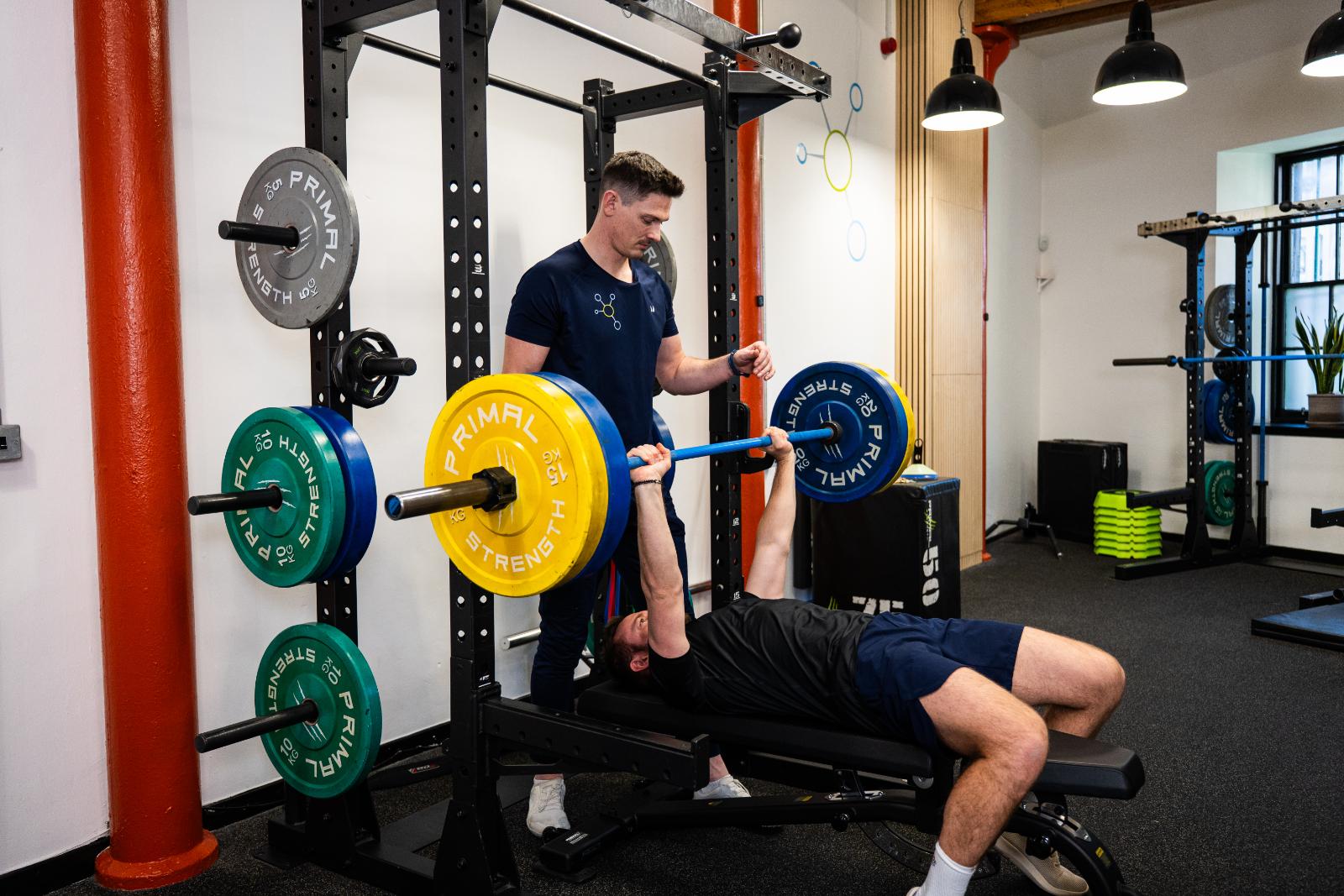 KA3_2495 Clinical supervision of a barbell bench press for personal training Edinburgh to ensure optimal shoulder stability and form.
