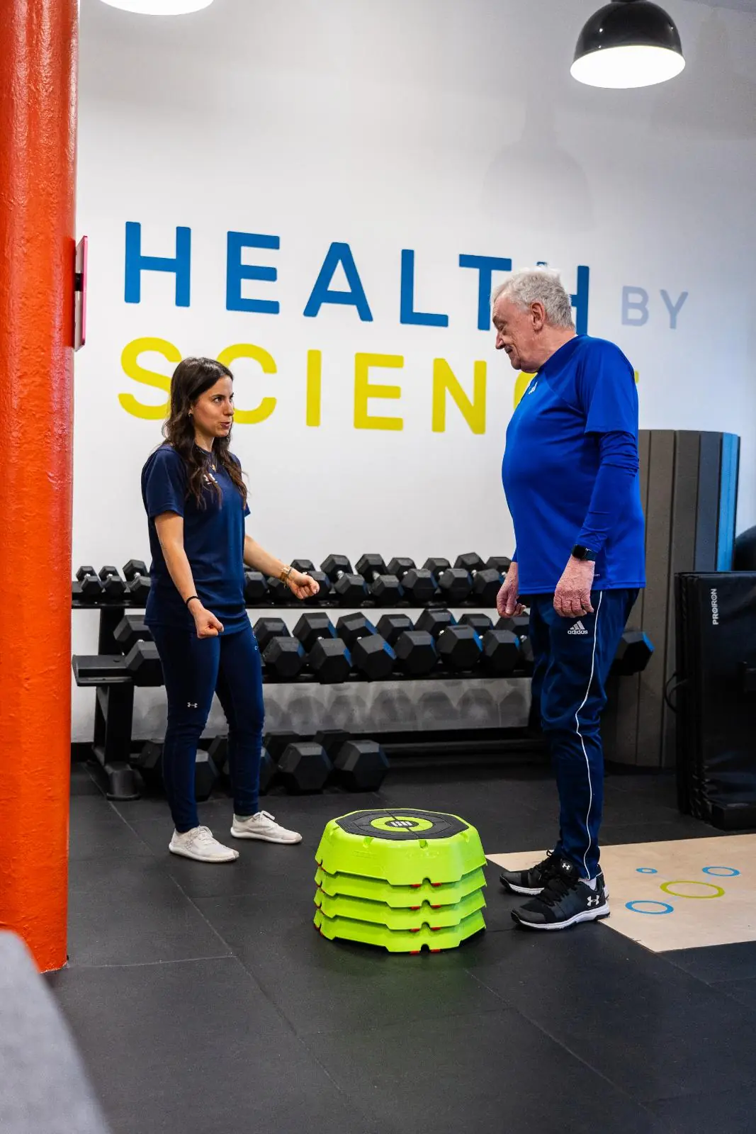 KA3_3023 Personal training edinburgh consultation and movement instruction for stepping exercises at our specialised clinical gym facility in Leith.