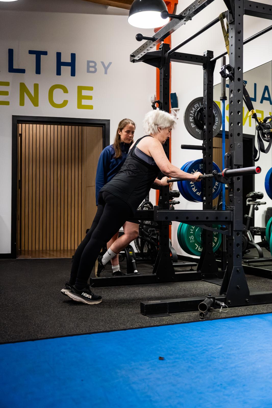 KA3_3502 Clinical supervision of an incline push-up progression for a senior patient to improve functional upper body capacity.