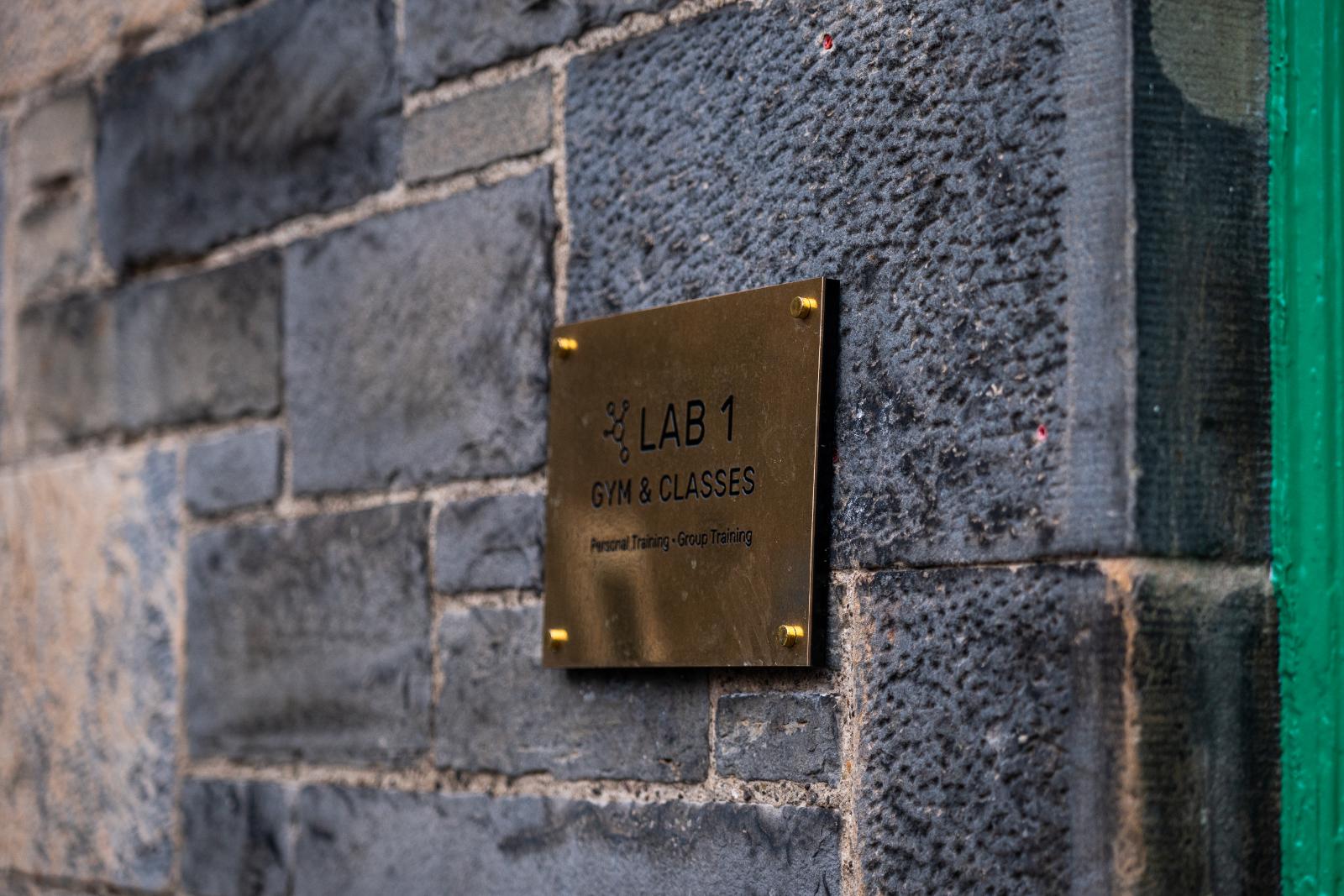 KA3_4007 Detailed view of the Lab 1 professional signage at Health by Science, specialising in evidence-based personal training Edinburgh.