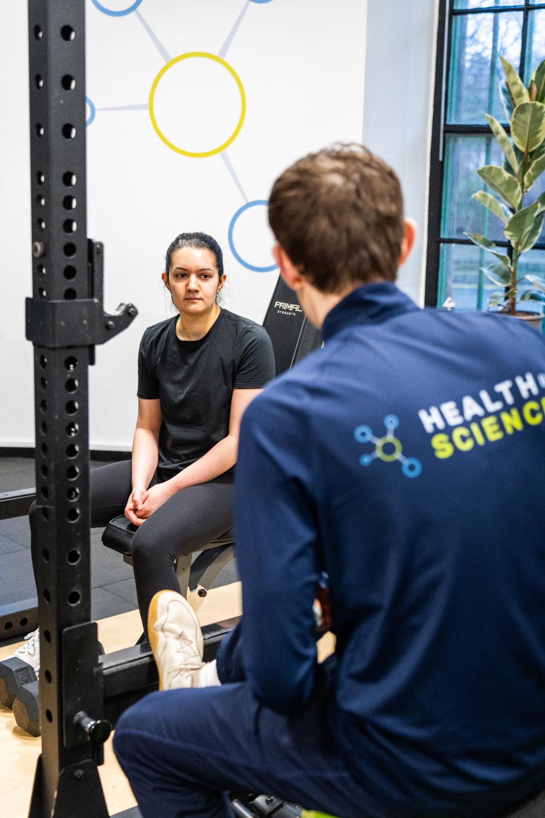 KA3_4071 Health by Science specialist conducting a clinical movement consultation with a patient in our specialised Leith rehabilitation gym.