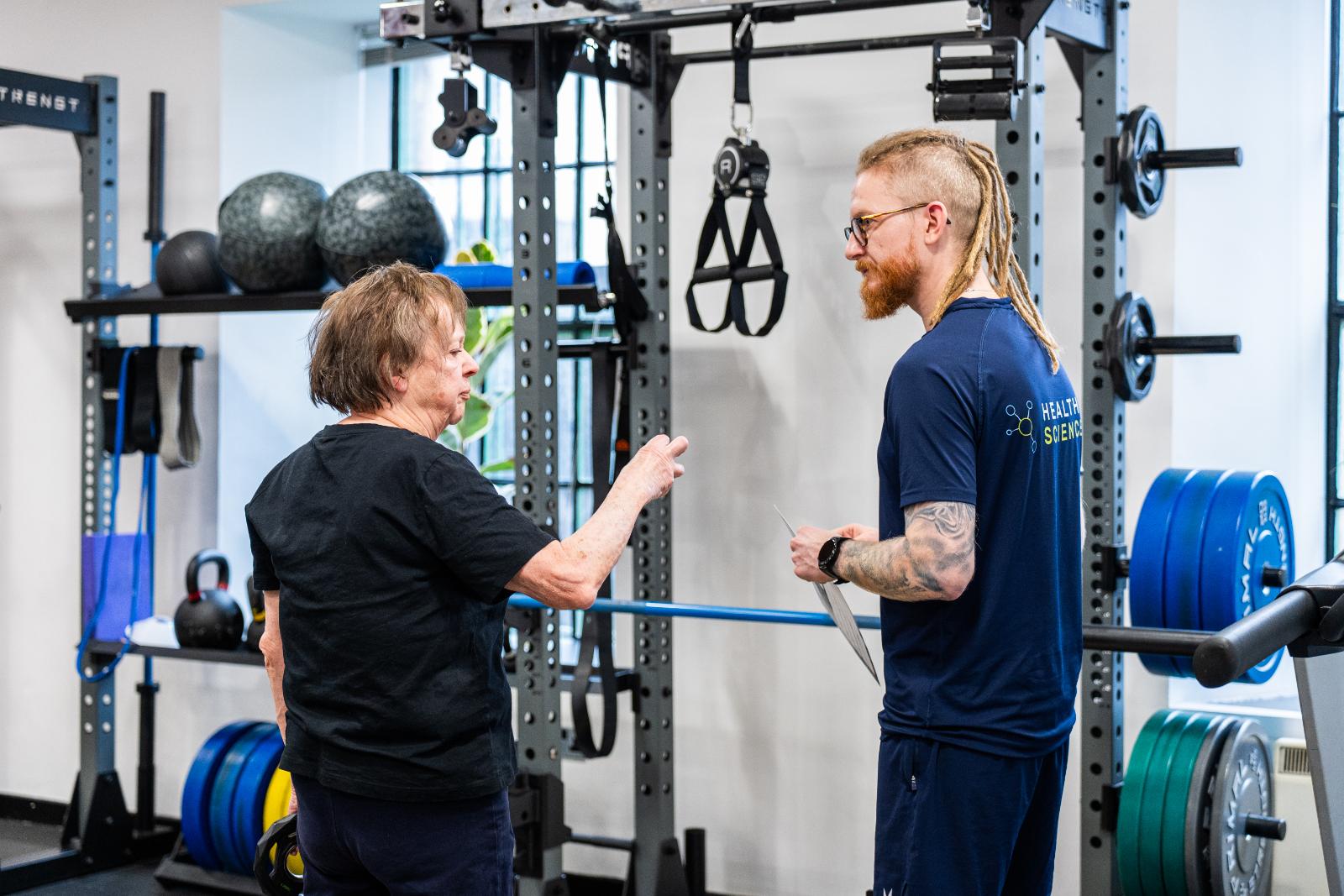 KA3_4384 Professional Health by Science practitioner providing a clinical movement assessment and technical advice to a senior patient in Leith.