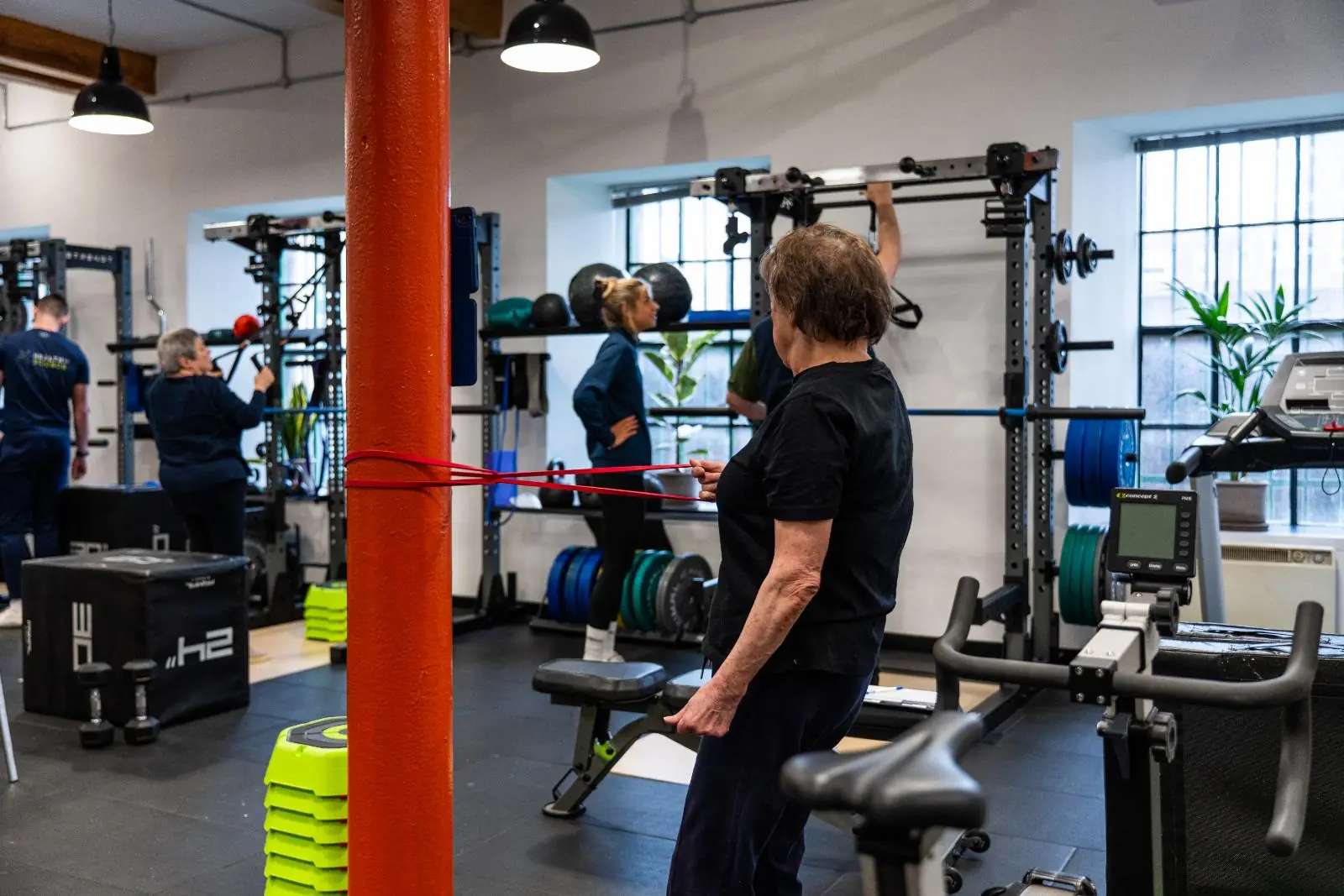 KA3_4443 Clinical supervision of a resistance band movement assessment for a senior client at our specialised Leith rehabilitation gym.