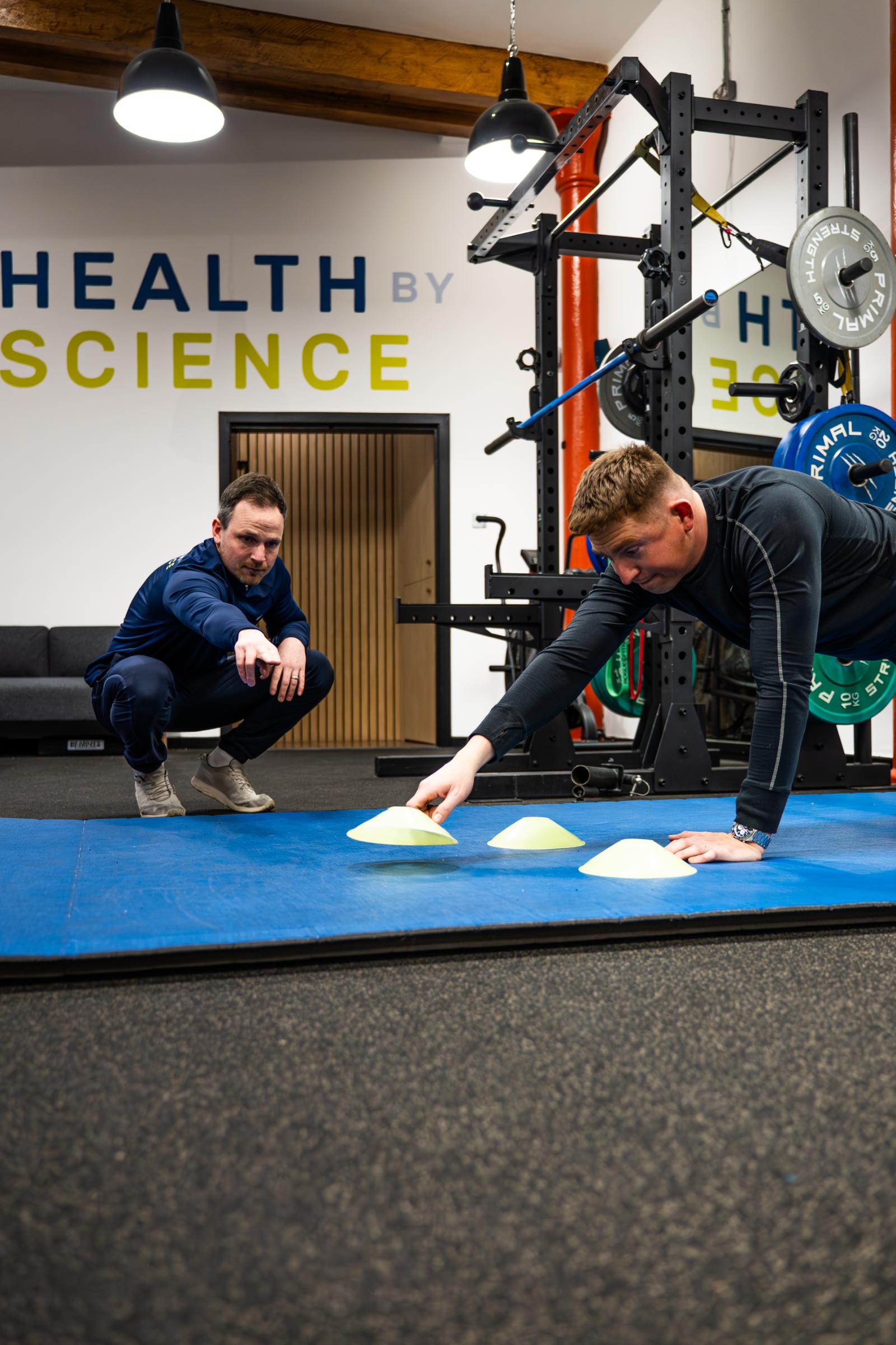 KA3_5158 Clinical physiotherapy edinburgh assessment of a plank progression with manual cues to improve lumbo-pelvic stability during injury rehabilitation.